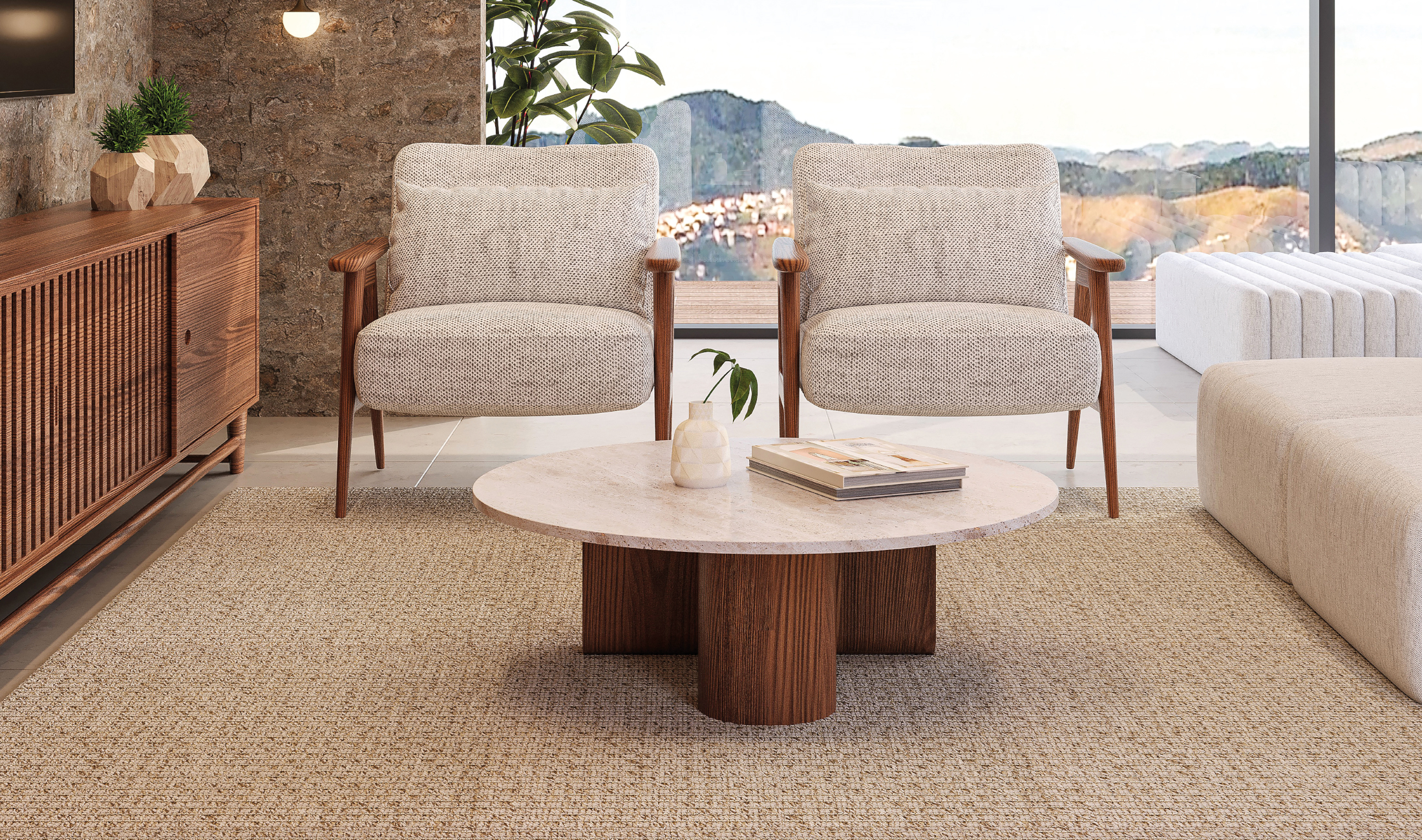 Lounge com poltronas e mesa de centro sobre tapete natural